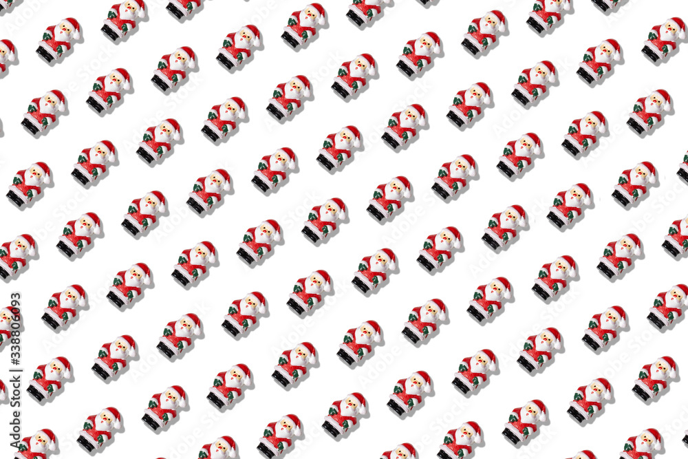 Christmas pattern with Santa Claus. Winter holiday texture. New Year background Christmas pattern with Santa Claus. Winter holiday texture. New Year background