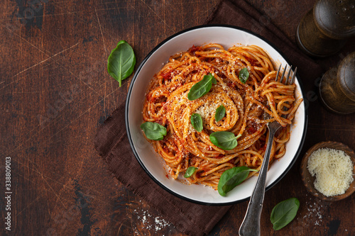 spaghetti pasta with tomato sauce  in white bowl