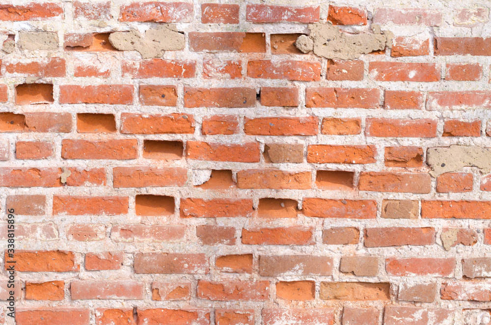 Naklejka premium Background and texture of a red brick wall