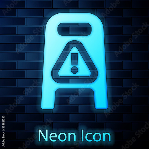 Glowing neon Wet floor and cleaning in progress icon isolated on brick wall background. Cleaning service concept.  Vector Illustration