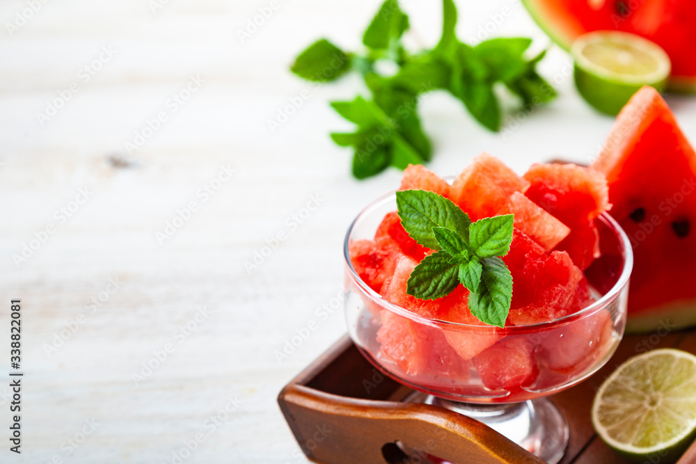 Pieces of watermelon with ice and mint Pieces of watermelon with ice and mint