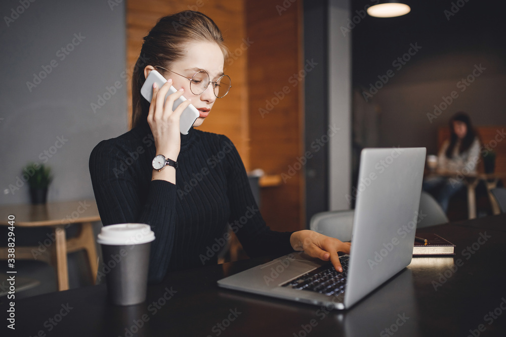 Hands close-up young female business online computer home with coffee mug, while quarantine from coronavirus in city Hands close-up young female business online computer home with coffee mug, while quarantine from coronavirus in city