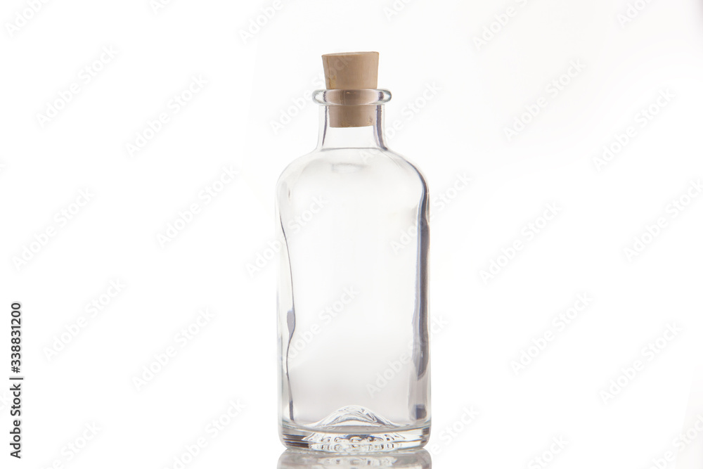 Beautiful transparent bottle with cap isolated on white background Beautiful transparent bottle with cap isolated on white background
