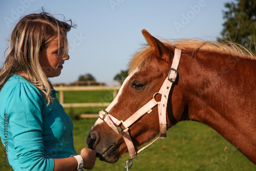 Young girl with horse © dabyg