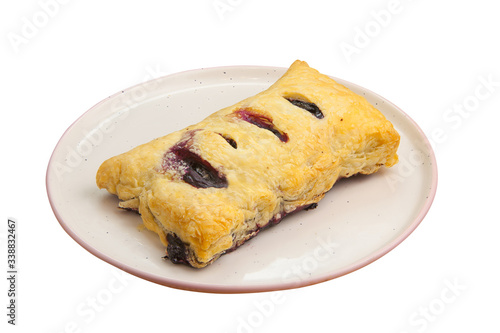 Delicious crispy bun with a plate on plate