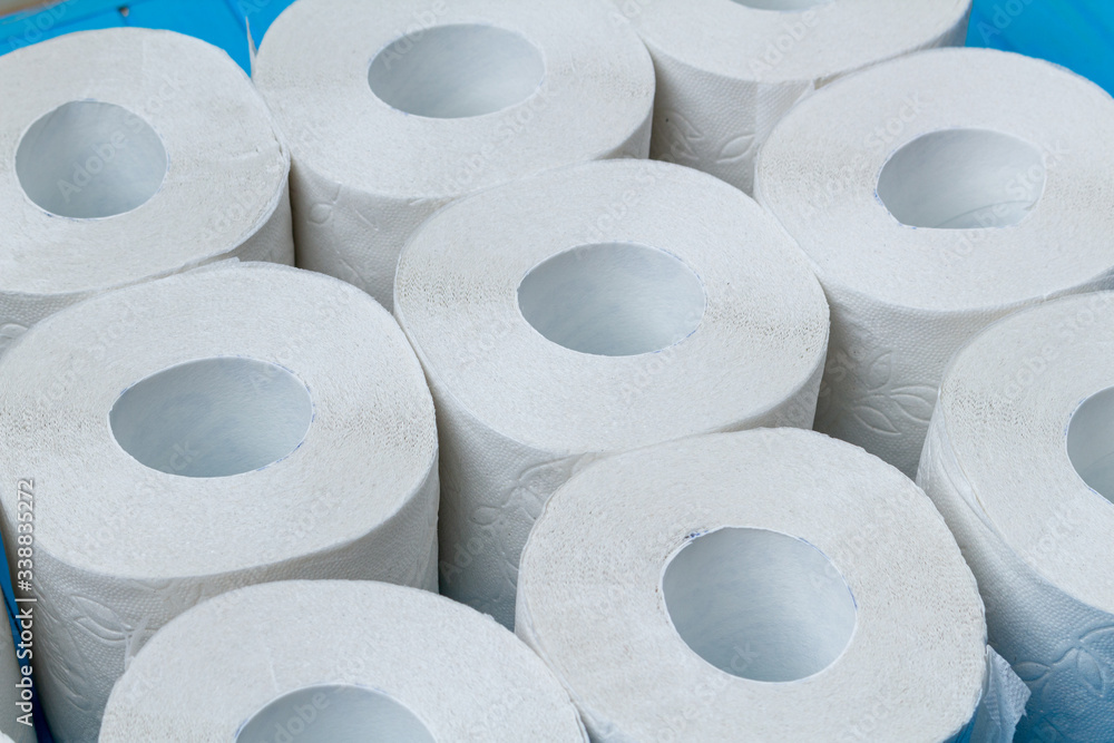 lots of toilet paper rolls background close up. Isolation, quarantine covid-19 concept. lots of toilet paper rolls background close up. Isolation, quarantine covid-19 concept.