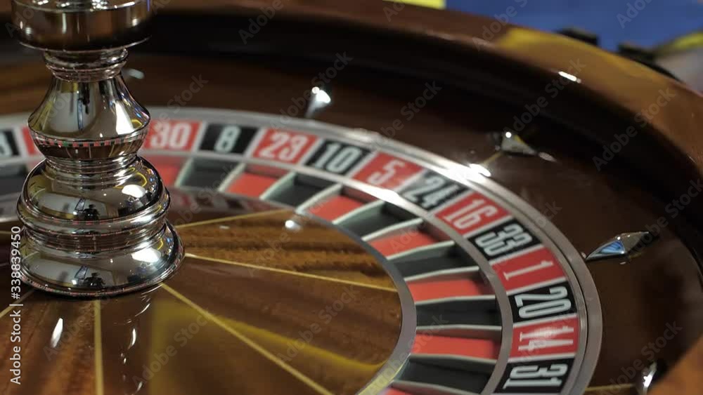Casino roulette in motion, the spinning wheel ball Casino roulette in motion, the spinning wheel ball