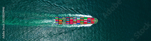 Aerial view container cargo ship in ocean, Business industry commerce global import export logistic transportation oversea worldwide, Sea shipping company vessel, copy space for web banner. photo