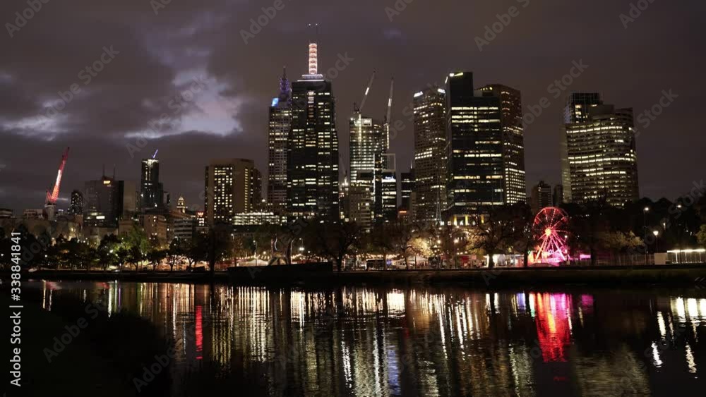 Night Time lapse of Melbourne city center reflected on the Yarra river Night Time lapse of Melbourne city center reflected on the Yarra river