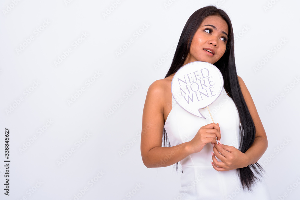 Portrait of young Asian businesswoman with paper sign Portrait of young Asian businesswoman with paper sign