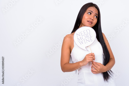 Portrait of young Asian businesswoman with paper sign