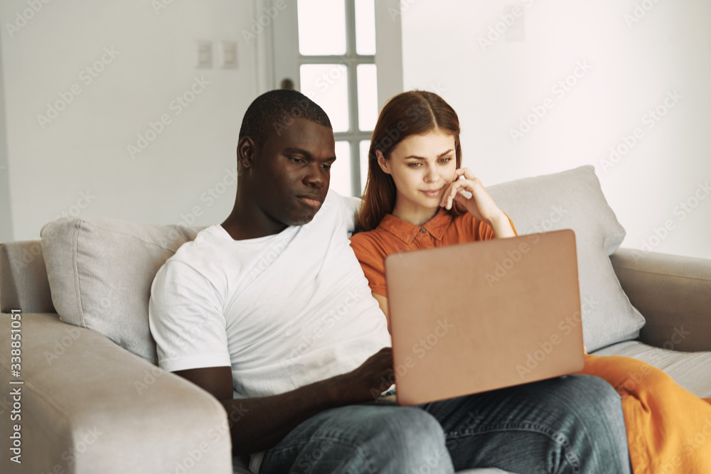 couple using laptop couple using laptop