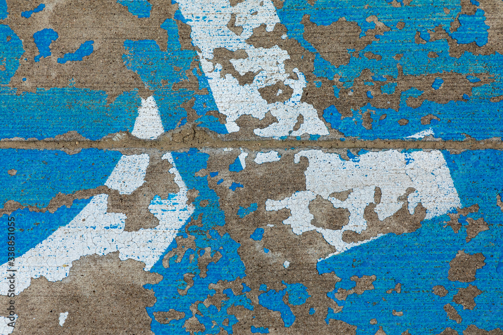 Weathered handicapped parking spot close up - transportation infrastructure road markings Weathered handicapped parking spot close up - transportation infrastructure road markings