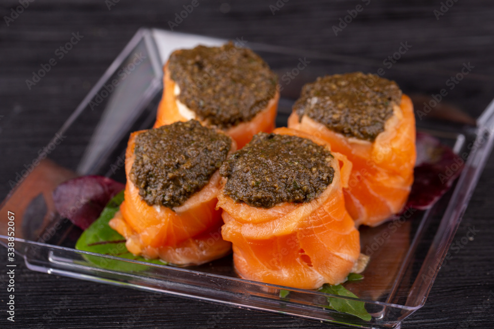 Canape of slightly salted trout with fish and green pate Canape of slightly salted trout with fish and green pate