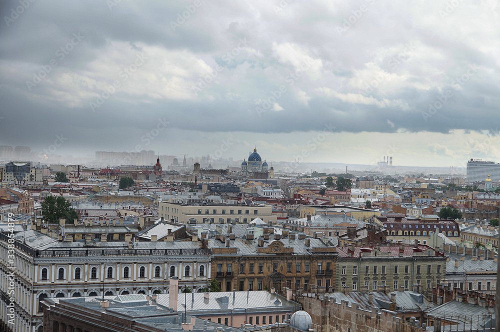Top view of the city of St. Petersburg in Russia with ancient buildings and churches, the city in a foggy haze in front