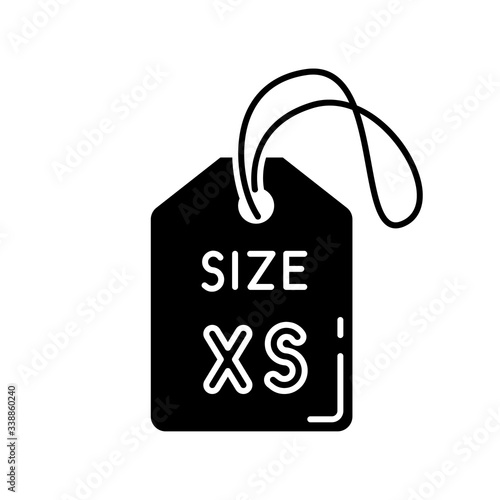 Extra small size label black glyph icon. Clothing parameters description silhouette symbol on white space. Informational tag with XS letters for mini size apparel. Vector isolated illustration