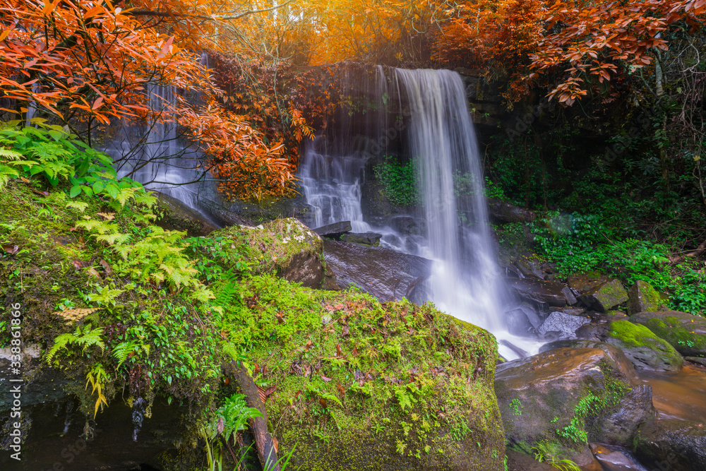 Fototapeta premium Waterfall scene at Rom Klao Pharadon Waterfalls in rainforest Thailand
