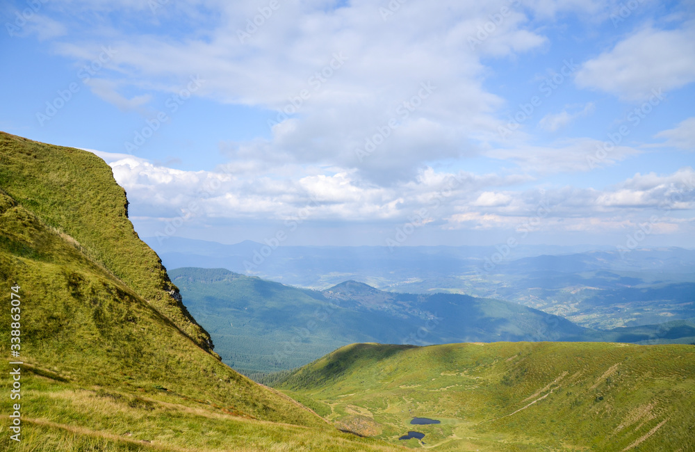 Cloudy sky and perfect look on Mountain lake Ivor and valley Dragobrat on Svydovets ridge. Carpathians, Ukraine, 