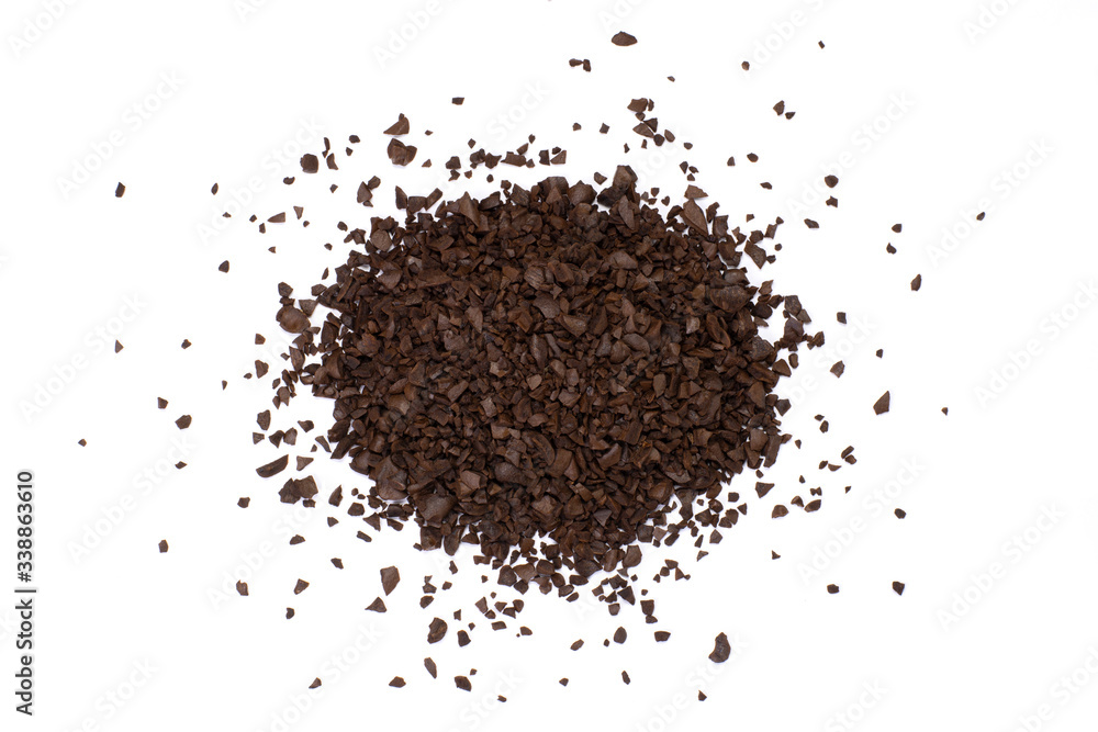 Pile of instant granulated coffee powder isolated on white background. Top view. Flat lay. Pile of instant granulated coffee powder isolated on white background. Top view. Flat lay.