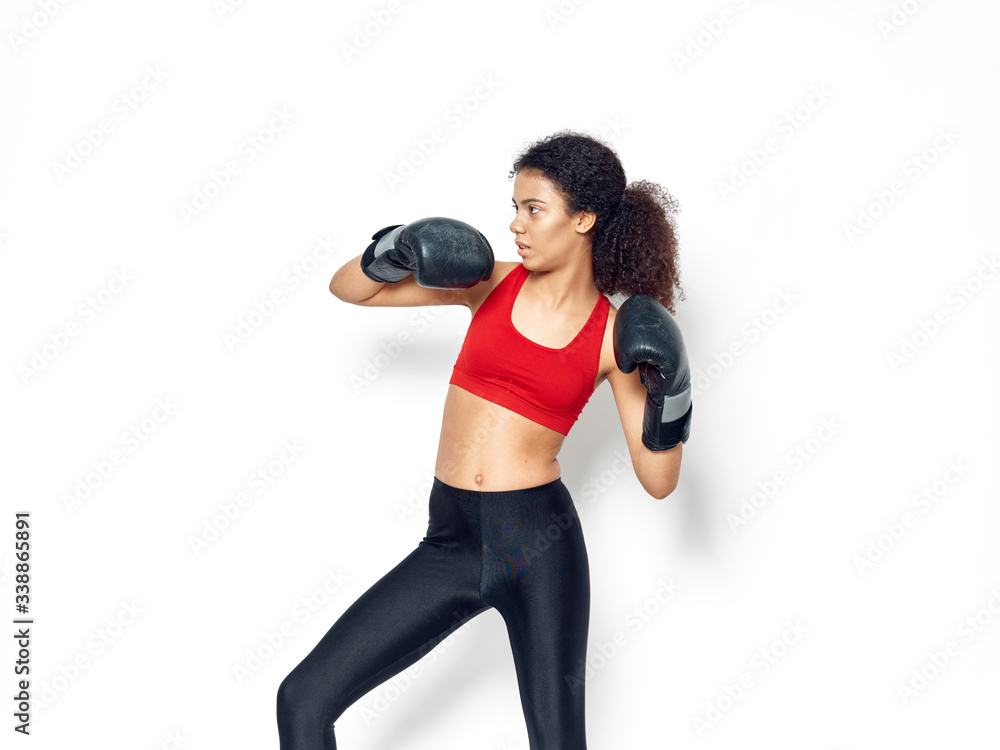 young woman with boxing gloves