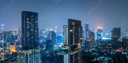 Commercial Building Viewpoint At Night  © Aris Suwanmalee