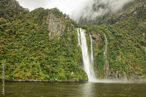 Milford Sound  - a fiord in the south west of New Zealand s South Island within Fiordland National Park.