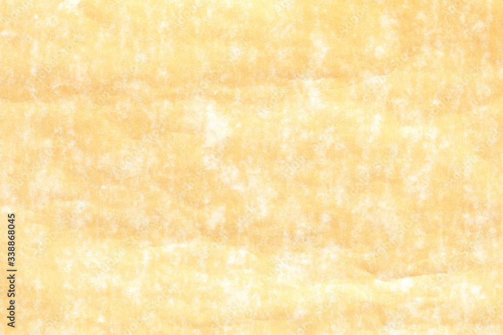 Old yellow paper with white stain  