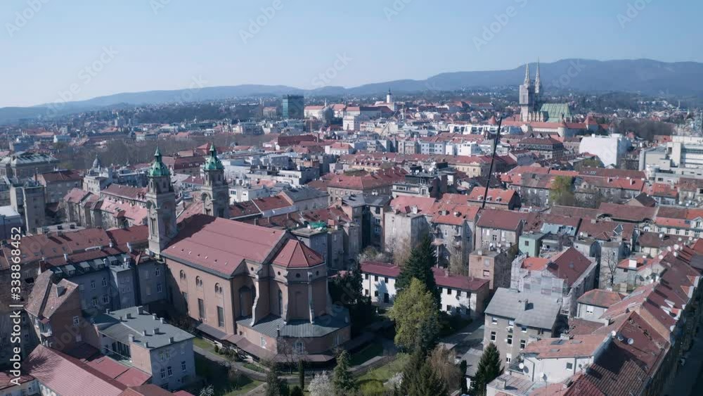 ZAGREB, CROATIA - April 2, 2020: Aerial view of the downtown panorama after the earthquake and during quarantine due to the covid-19 pandemic. Basilica of Sacred Heart of Jesus in the front. ZAGREB, CROATIA - April 2, 2020: Aerial view of the downtown panorama after the earthquake and during quarantine due to the covid-19 pandemic. Basilica of Sacred Heart of Jesus in the front.