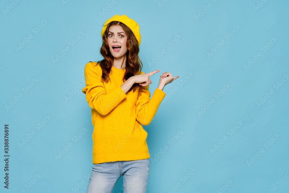 young woman holding a yellow folder young woman holding a yellow folder
