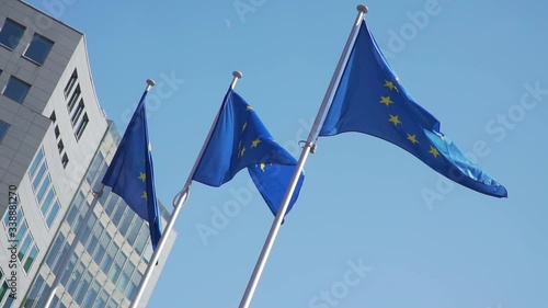 Brussels, Belgium - 04/11/2019 European Union flags wave in the wind in front of the European Commission. European cartier. Full HD, 1080p 100fps