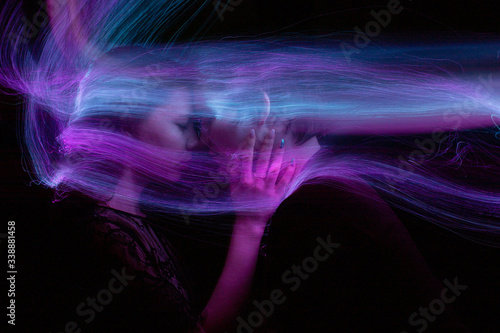 freezlight new photo art direction, long exposure photo without photoshop, light drawing at long exposure, portrait of a couple 