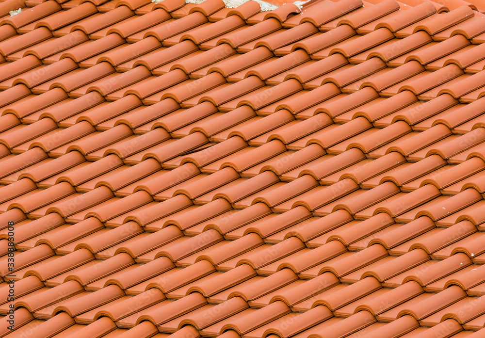 Fototapeta premium Red shingles on a rooftop.