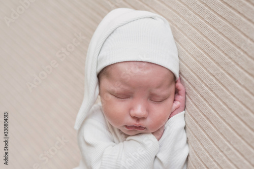 Sleeping newborn baby. Healthy and medical concept. Healthy child, concept of hospital and happy motherhood. Infant baby. Happy pregnancy and childbirth. Children's theme. Baby and childen's goods