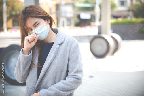 Virus mask Asian woman travel wearing face protection in prevention for coronavirus.