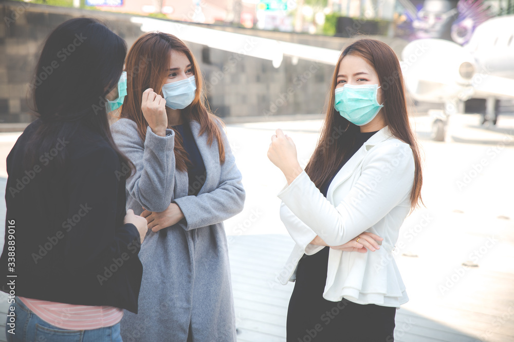 Three confident businesswomen talking and wearing face protection in prevention for coronavirus. Three confident businesswomen talking and wearing face protection in prevention for coronavirus.