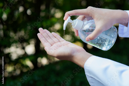 Close up hand sanitizer alcohol gel rub clean hands hygiene prevention of coronavirus virus