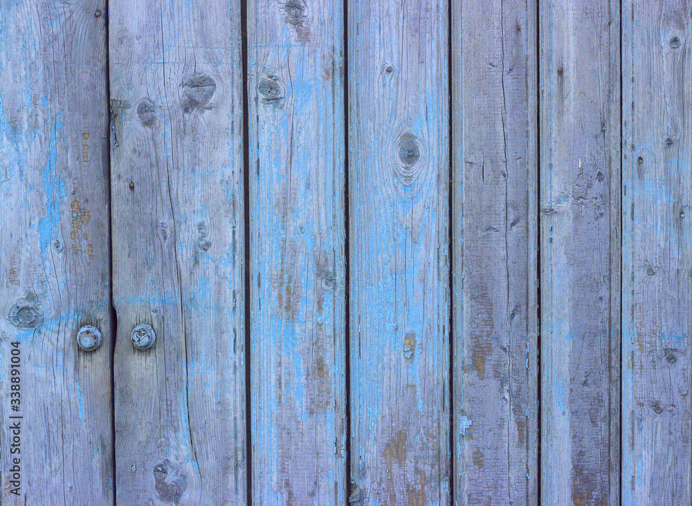 Texture of an old wooden fence with the remains of blue paint. Good background for social networks
Texture of an old wooden fence with the remains of blue paint. Good background for social networks
