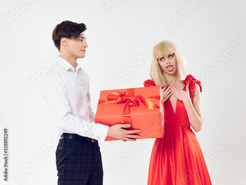 young couple with gift box