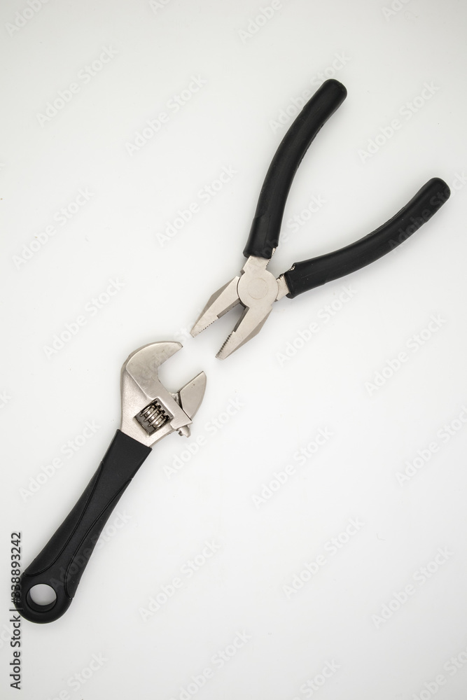 Pliers, hammer, wrench isolated in white background Pliers, hammer, wrench isolated in white background
