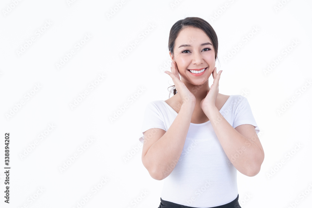 Portrait images of Asian young, pretty woman is 25 years old, She is smiling brightly, She has beautiful white and clean teeth, sparking eyes On white background to people and beauty concept. Portrait images of Asian young, pretty woman is 25 years old, She is smiling brightly, She has beautiful white and clean teeth, sparking eyes On white background to people and beauty concept.
