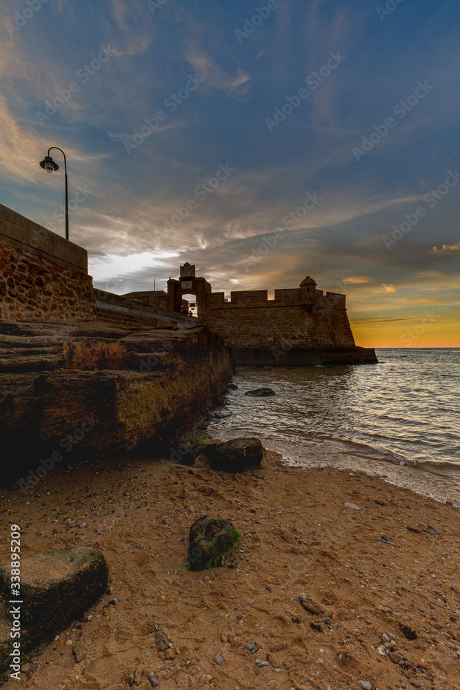 Sunset at the Castillo de San Sebastian in Cadiz, Andalusia, Spain.