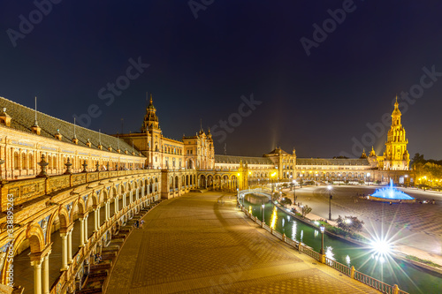 Night at the Plaza de Espana in Seville, Andalusia, Spain.