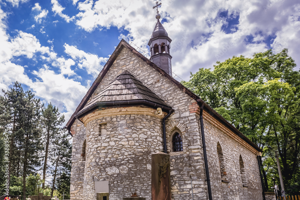 Small church with graveyard in Bydlin village in Lesser Poland region, Poland