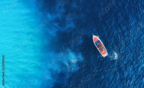 Croatian seascape with boat. Yachts at the sea surface. Aerial view of luxury floating boat on blue Adriatic sea at sunny day. Travel - image