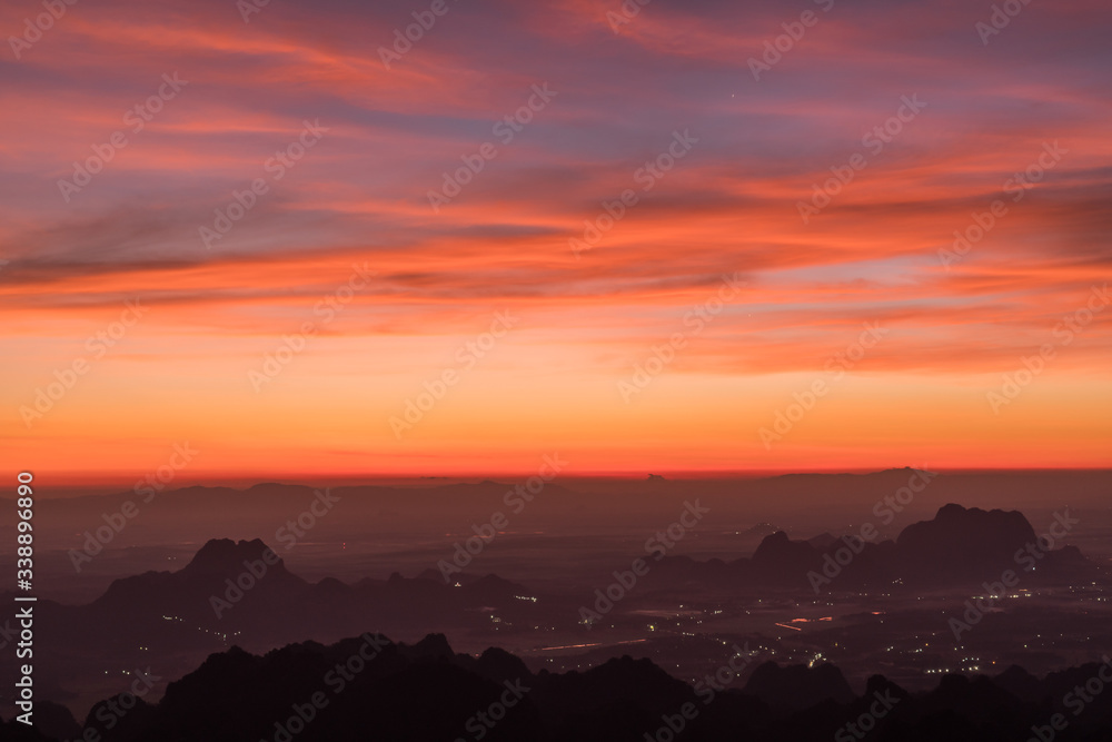 View of the sunrise over the countryside from the summit of Mt. Zwegabin, Hpa-An, Myanamr