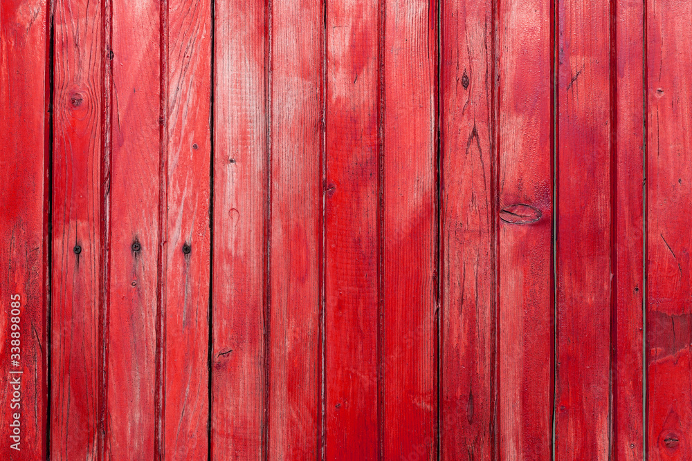 The old red wood texture with natural patterns The old red wood texture with natural patterns
