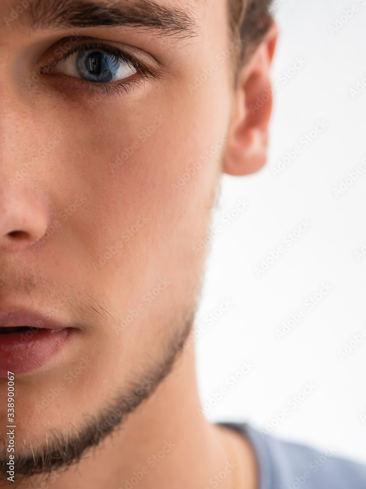 Half face of a guy with blue eyes