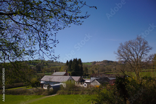 welsh farmhouse in countryside photo