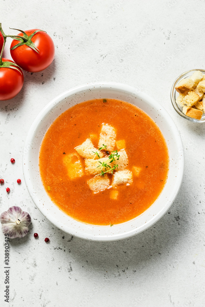 Creamy basil tomato soup. Top view, copy spce. Creamy basil tomato soup. Top view, copy spce.