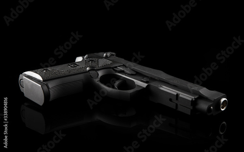
Black gun on a black table